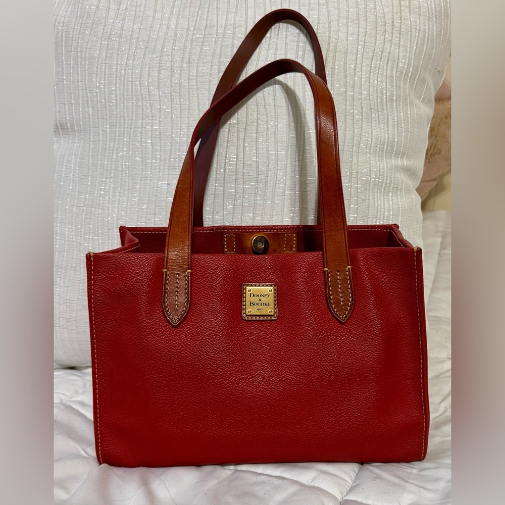 Dooney & Bourke Tote unique dark red color with Tan Handles